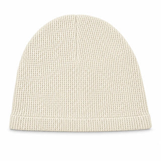 Off-white waffle knit skull cap on a white background