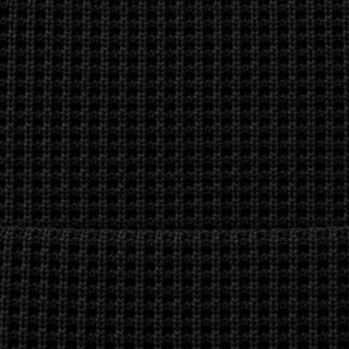 Close-up of the cotton waffle knit and the folded hem
