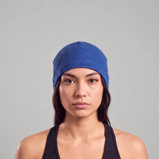Woman wearing the cobalt waffle knit skull cap